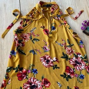 Beautiful top. Sleeveless never worn.